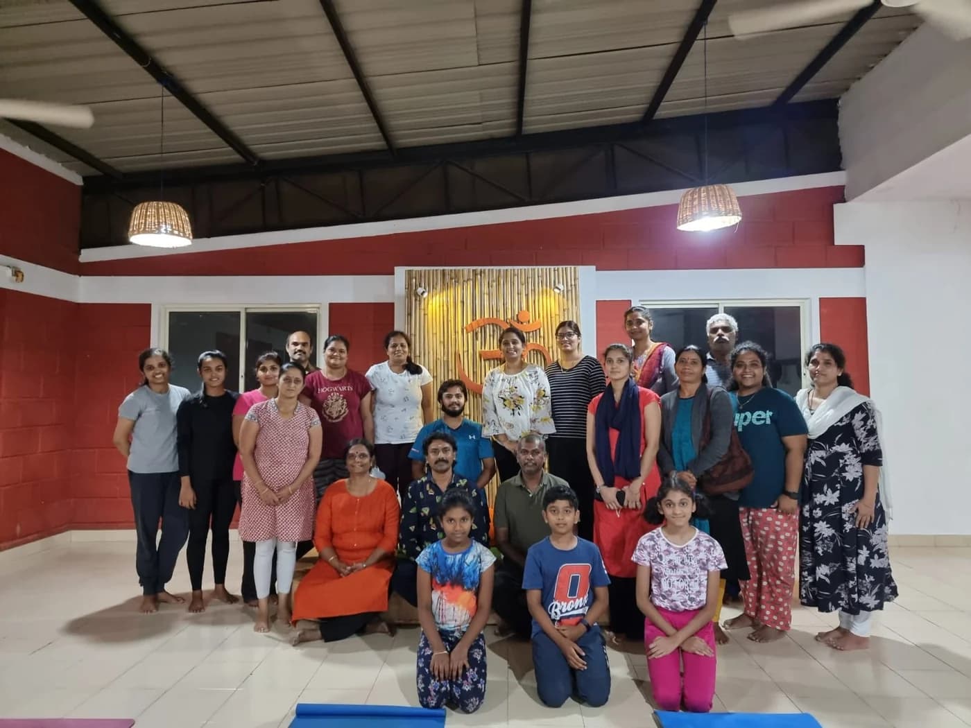 A full class of students together at the Swastha Yoga studio