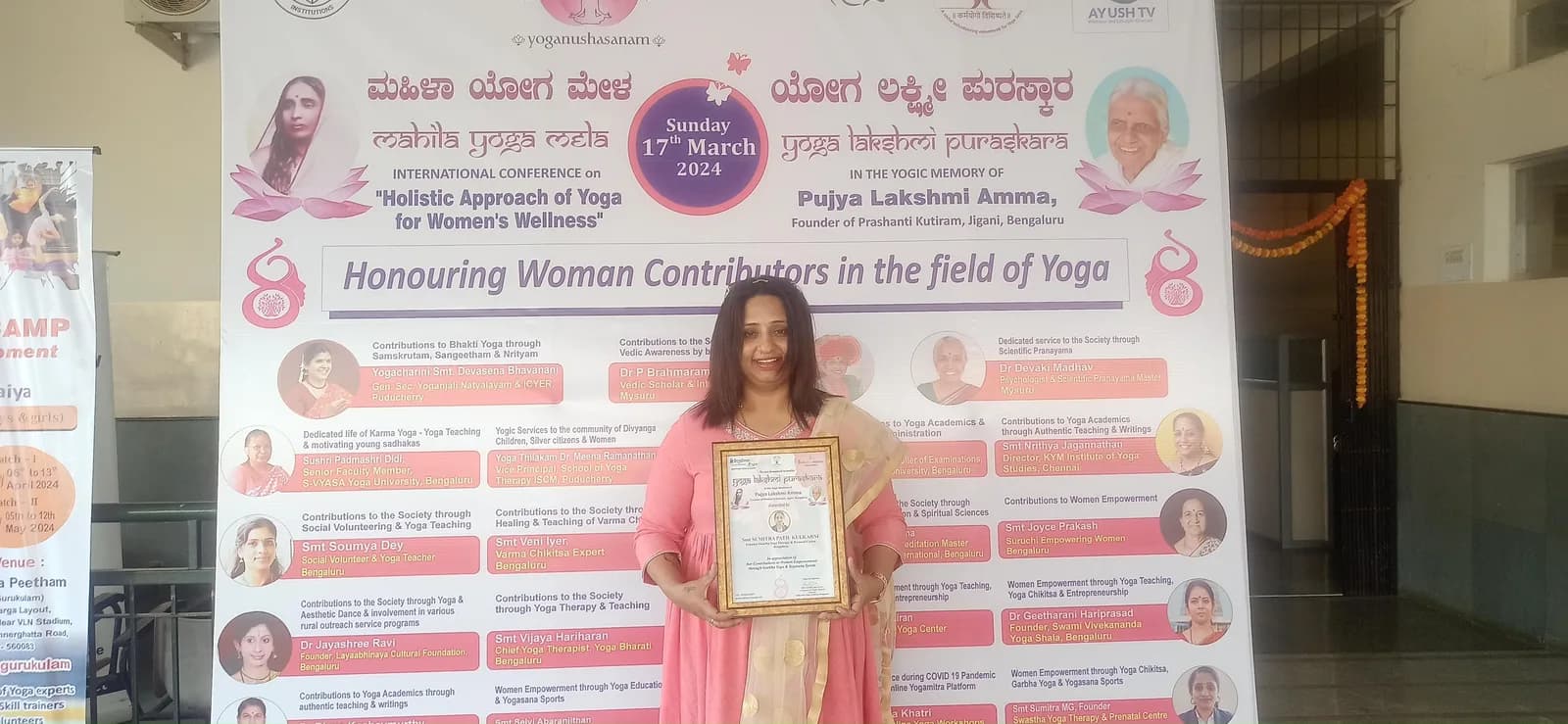 Dr. Sumitra M Patil honored at the Yoga Lakshmi Puraskara for contributions to women's empowerment through yoga